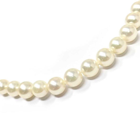 Filo di Perle Mikimoto 7.5/7 mm con Chiusura in Oro