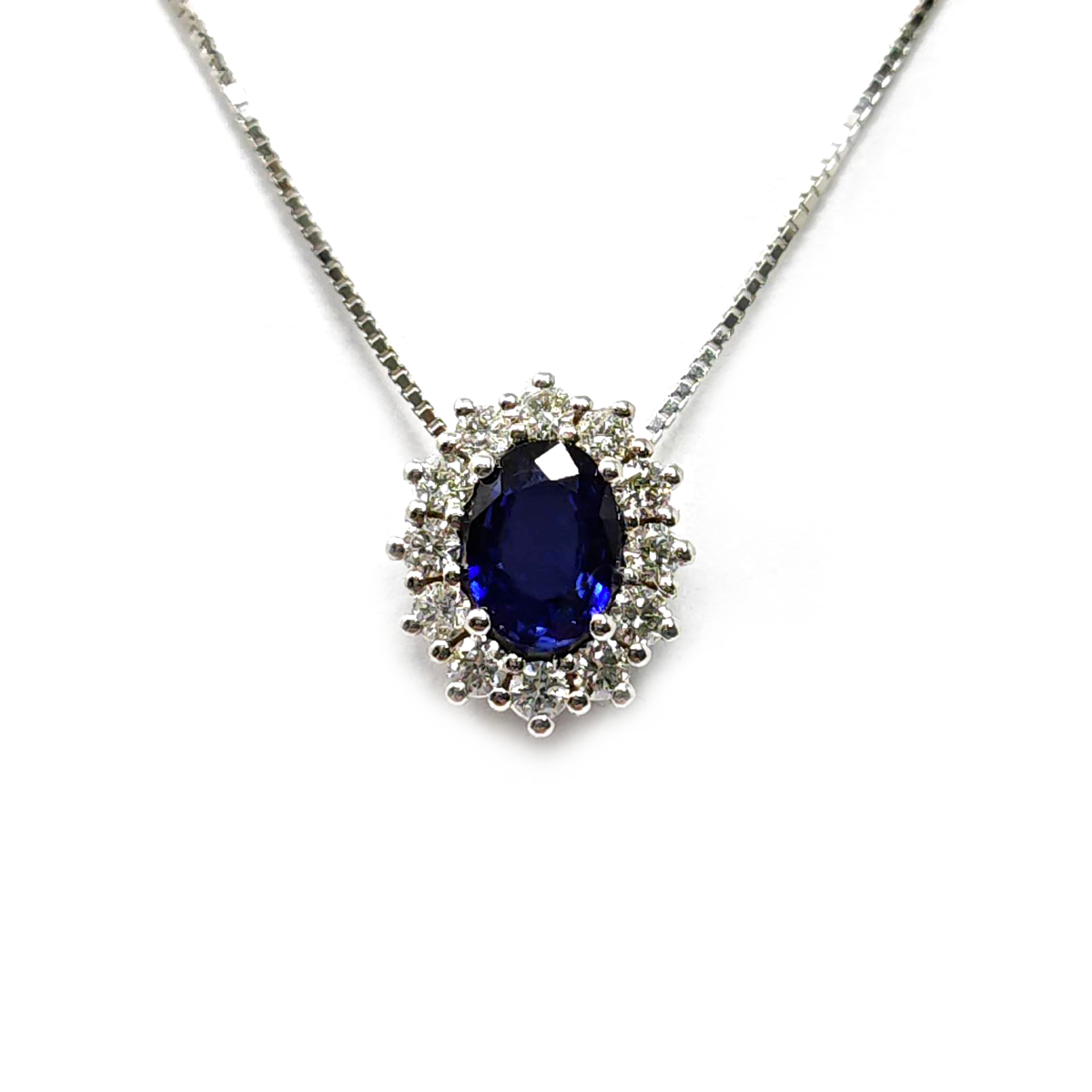 Pendente in Oro Bianco 18kt con Zaffiro CT 0.80 e Diamanti CT 0.36