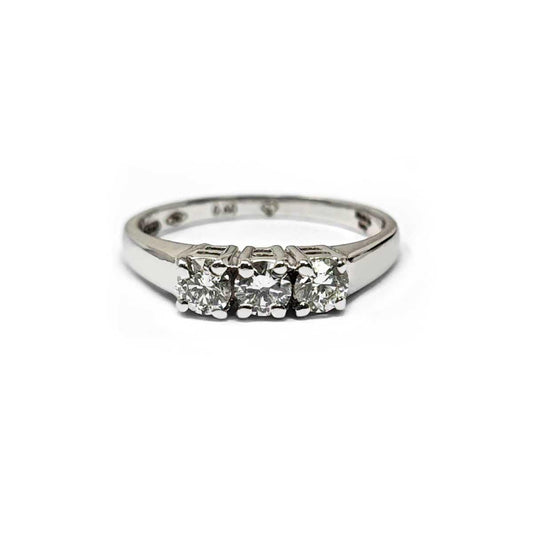 Anello Trilogy con Diamanti CT 0.60