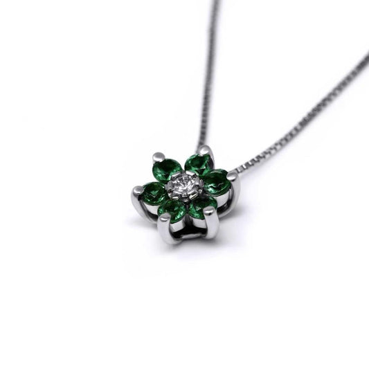 Pendente Linea Fiore con Diamante CT 0.04 e Smeraldi CT 0.24