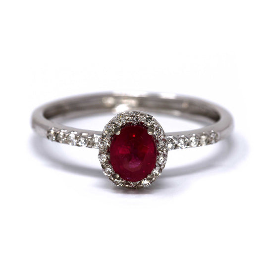 Anello con Rubino Ovale CT 0.30 e Diamanti Bianchi naturali CT 0.12