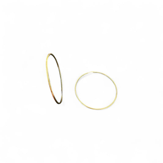 Orecchini grandi a cerchio in argento dorato