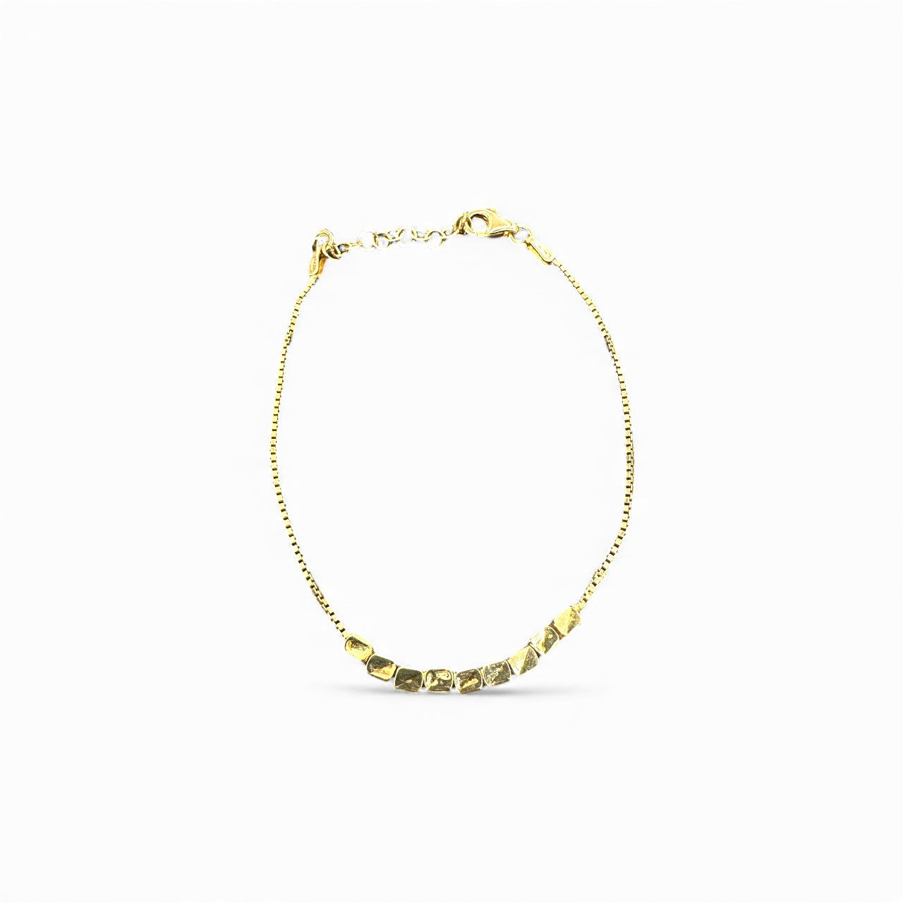 Bracciale in argento 925 dorato con elementi geometrici martellati