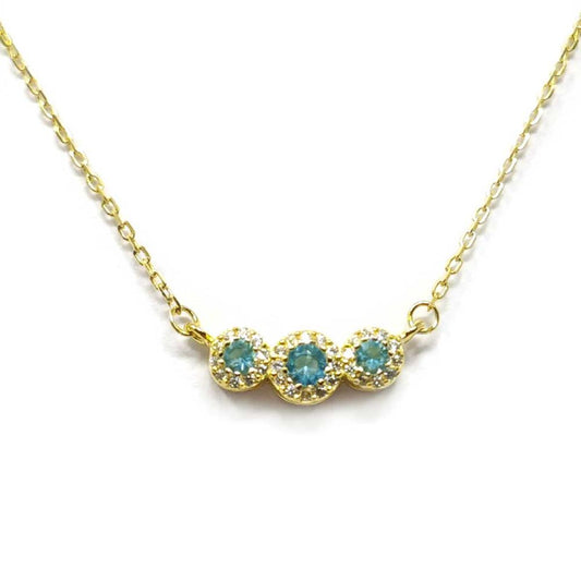 Pendente a margherita con pietre centrale colorate e zirconi a girare