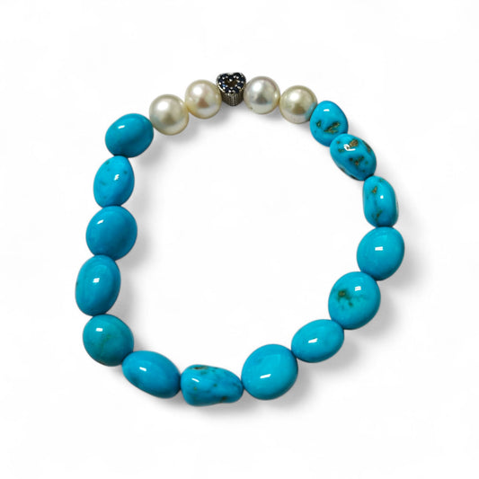 Bracciale con pietre in pasta di turchese e charm in argento