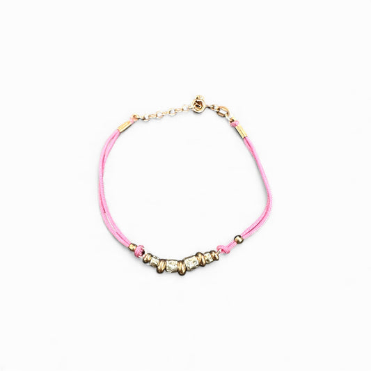 Bracciale con cordino rosa e sfere in argento 925 dorato