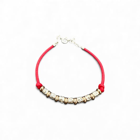 Bracciale con cordino rosso e sfere in argento 925 dorato