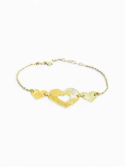 Bracciale in Argento Dorato con Tre Cuori Martellati – Centrale Forato